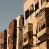 pexels-photo-28506301-28506301 Sunlit traditional architecture in Al-Balad, Jeddah, showcasing historic charm and intricate design.